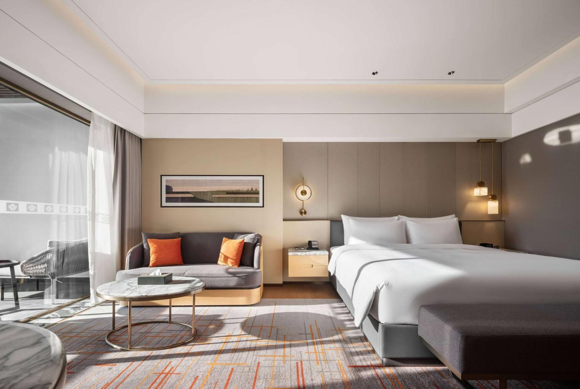 Отель Wyndham Grand Zhaoqing Downtown Экстерьер фото