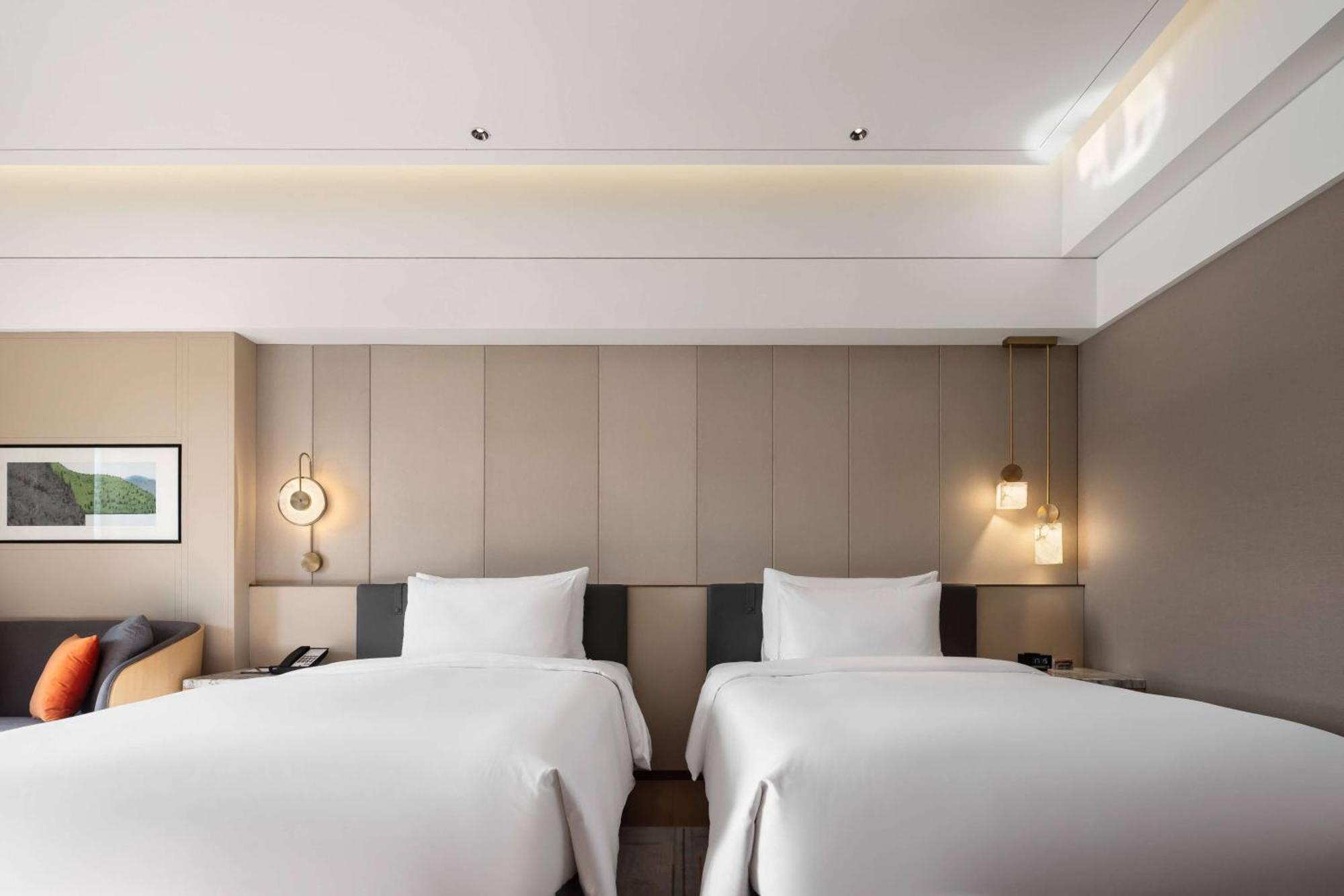 Отель Wyndham Grand Zhaoqing Downtown Экстерьер фото