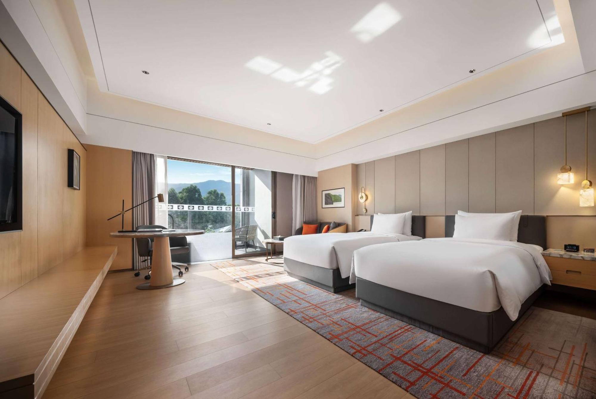 Отель Wyndham Grand Zhaoqing Downtown Экстерьер фото