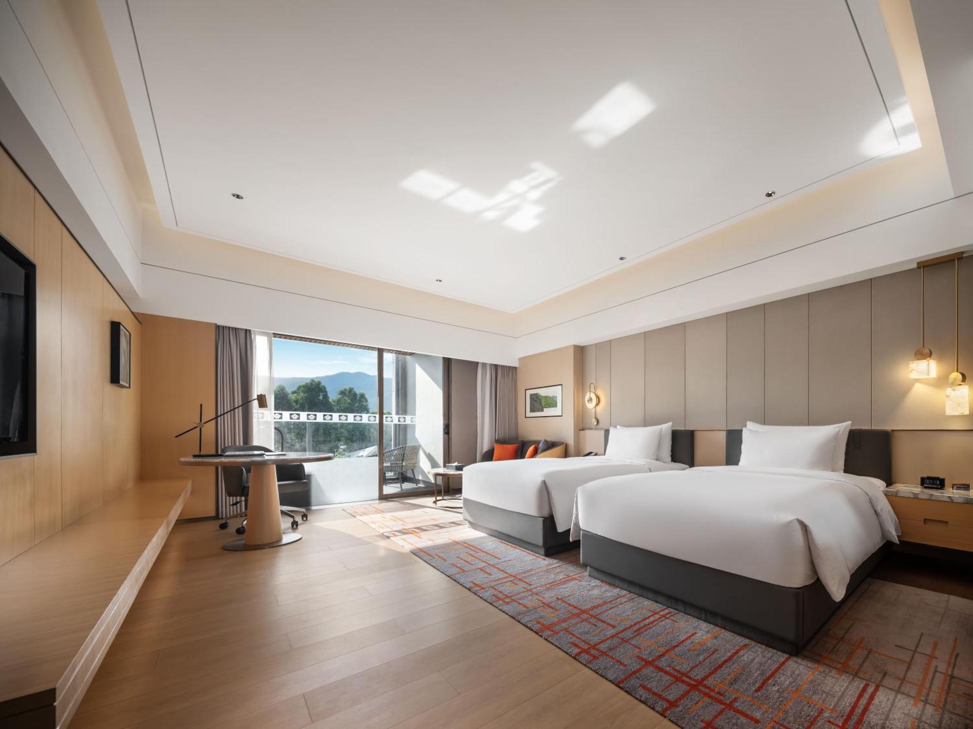 Отель Wyndham Grand Zhaoqing Downtown Экстерьер фото