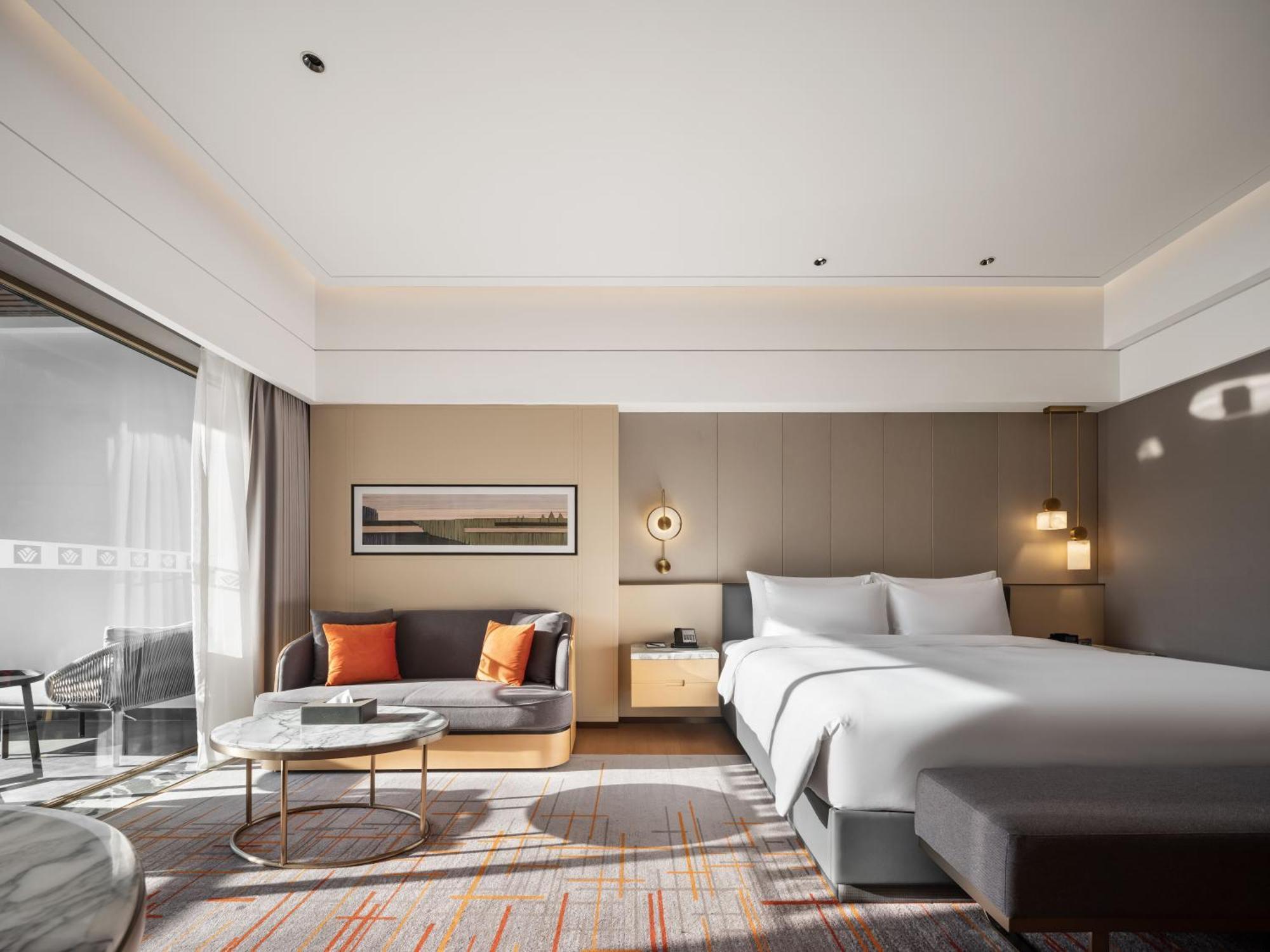 Отель Wyndham Grand Zhaoqing Downtown Экстерьер фото